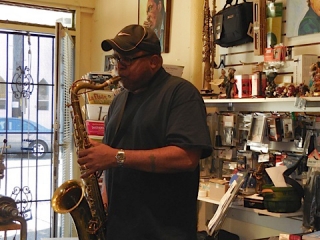 Charles McNeal, jazz saxophonist trying out saxophone at Steve Deutsch Woodwinds
