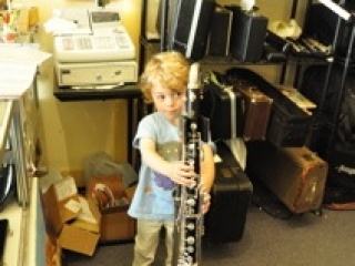 Park tries out a bass clarinet at Steve Deutsch Woodwinds in Berkeley California