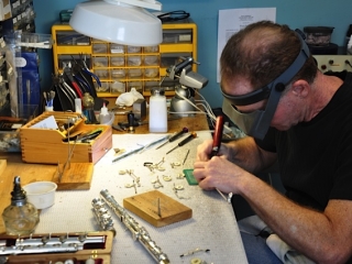 Master FLute Repairtman Pauil Rabinov at work.